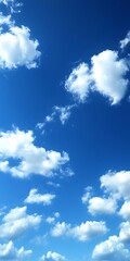Blue sky with fluffy white clouds.