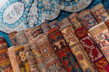 Traditional Turkish carpets are offered for sale at a bazaar
