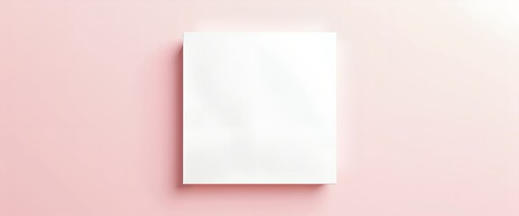 Fototapeta premium Blank white book cover mockup on a pink background. Perfect for showcasing your design or branding. Clean, simple, and minimalist aesthetic. Ideal for presentations or marketing materials.