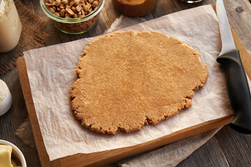 Dough made of whey protein powder, maple syrup and peanut butter - ingredient for homemade protein bars