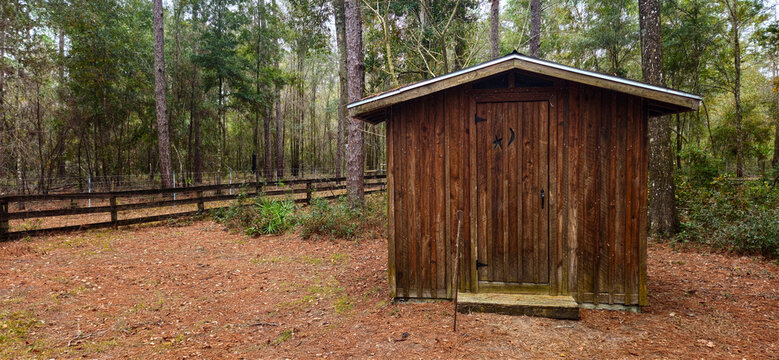 An old fashioned out house 