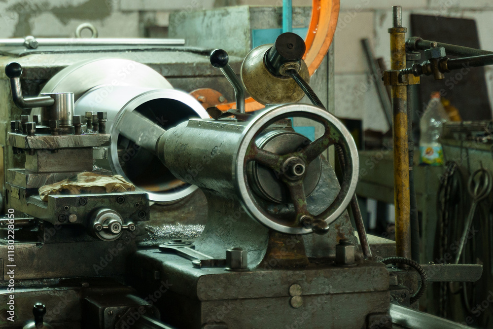 Poster machinery in action at a vibrant workshop creating precise metal parts