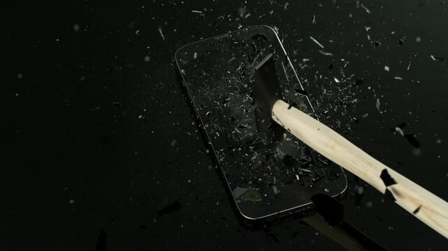 Super Slow Motion Shot of Hammer Breaking Mobile Phone Glass at 1000fps.