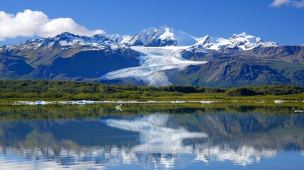 Fototapeta premium Majestic icebergs drifting elegantly in tranquil arctic waters under clear blue skies