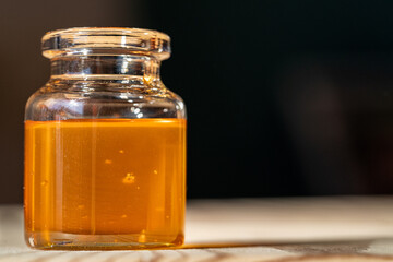 bottle of honey on the table