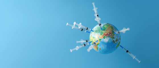 Planet Earth (globe) spiked with many syringes on a blue background. Concept of universal...