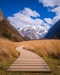 Papier peint photo  Envisioning the travel experience of a wooden trail in the Hooker Valley Track amidst snowfall in Aoraki, Mount Cook National Park, situated on the South Island of New Zealand.  © Halina Berah