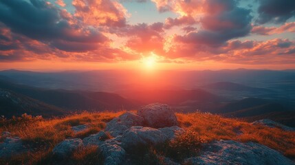 Fototapeta premium Sunset over rolling hills and a glowing horizon