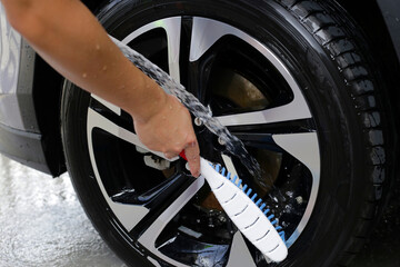 Washing car, cleaning tires and wheels