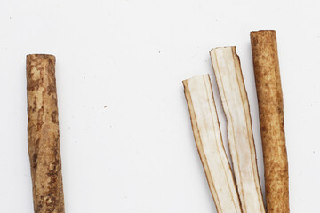 Burdock Root (Gobo) on white background.
