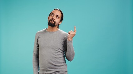 Cheerful man acting casually, exuding nonchalant and carefree demeanor. Portrait of jolly person...