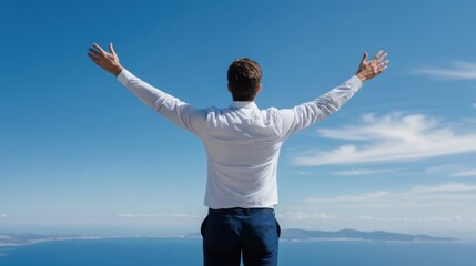Man Celebrating Freedom Against Sky and Ocean Landscape, Arms Wide Open, Feeling Inspired and Alive