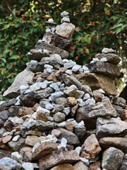 Stacked stones create natural sculpture in garden