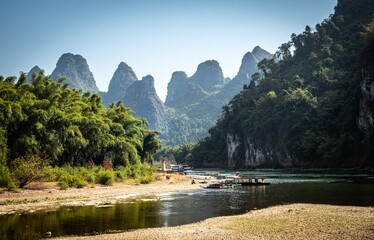 Guilin Cruise: Li River flows through a green forest and karst mountains. China