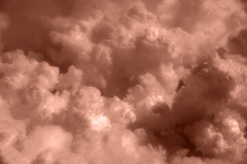 Banner. Color of the year, 2025, mocha mousse,. Sky cloudy background, dark clouds for rainy weather and sad mood