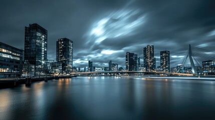 Fototapeta premium Night Cityscape Reflection Over Water with Dramatic Cloudy Sky