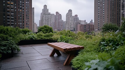 Fototapeta premium A tranquil rooftop garden hosts a simple wooden bench amidst the sprawling city skyline, offering a peaceful retreat.
