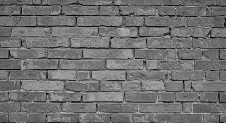 Obraz premium Beautiful aligned gray brick wall in old and rusty way in construction