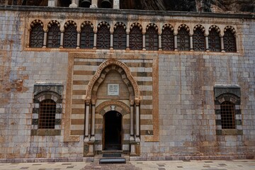 Monastery of Qozhaya. Ottoman style church carved in the rocks in Kadisha valley