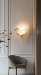 Bird shaped wall lamp on light pink wall, with chair.