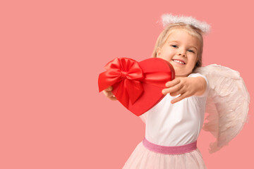 Cute little girl dressed as cupid with heart-shaped gift box on pink background. Valentine's Day celebration