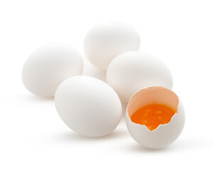 Cracked and whole chicken eggs isolated on white background, closeup