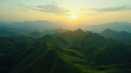 Sunset over lush green karst mountains, aerial view, travel brochure
