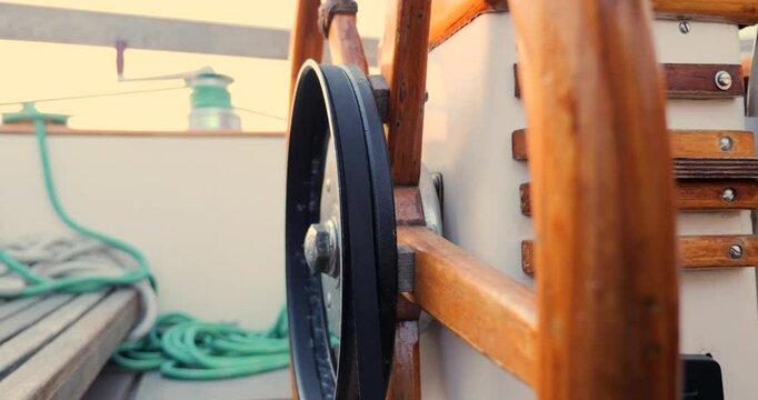 View of the rudder on a sailboat steered by an electric autopilot while crossing the Bay of Biscay