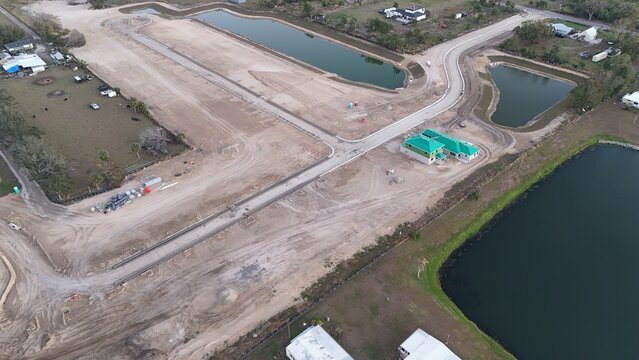 new South Florida home development must work around existing properties that will not sell their land