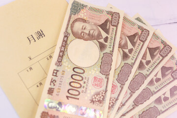 新紙幣一万円札と月謝袋