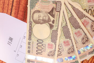 新紙幣一万円札と月謝袋