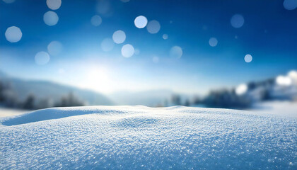 A background of snowy scenery with a blurred effect. Image of a snowy mountain under a blue sky. A background of a ski slope.