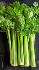 Obraz premium Fresh Green Celery Stalks: Healthy and Delicious