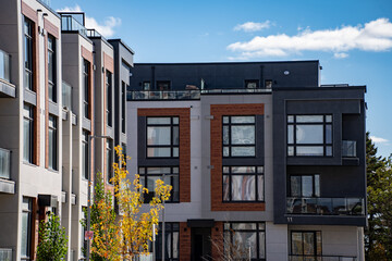 Exterior view of modern apartment building offering luxury units.