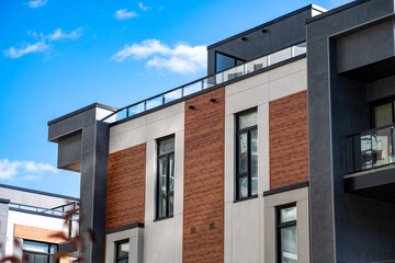 Exterior view of modern apartment building offering luxury units.
