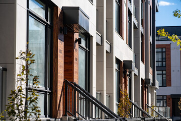 Exterior view of modern apartment building offering luxury units.
