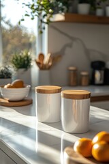 Sunlit Modern Kitchen Interior with White Ceramic Canisters and Wooden Lids on Marble Countertop, Surrounded by Fresh Fruits and Greenery