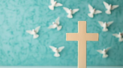 Obraz premium A serene image featuring a wooden cross in the foreground with white doves flying against a textured turquoise background.Eternal Life, Salvation, Grace, Easter