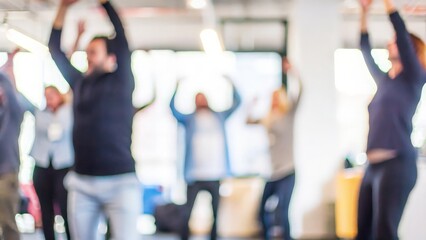 Workplace Wellness Event Blur – A blurry image of a workplace wellness event, with employees participating in health activities.
