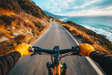 A cyclist rides along a coastal road, capturing a sense of speed and adventure with a stunning ocean backdrop.