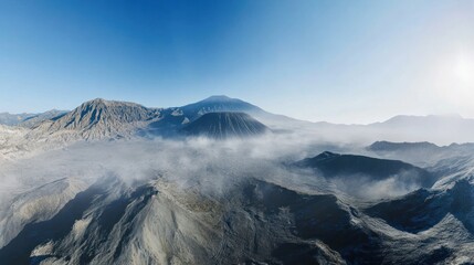 Volcanic panorama, sunrise mist, mountain range, aerial view, travel poster