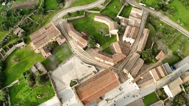 riprese aeree della Chiesa di Santa Maria di Monserrato presente nel Borgo medievale di Tratalias in Sardegna in Italia