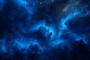 Blue nebula cosmic clouds and stars in deep space.