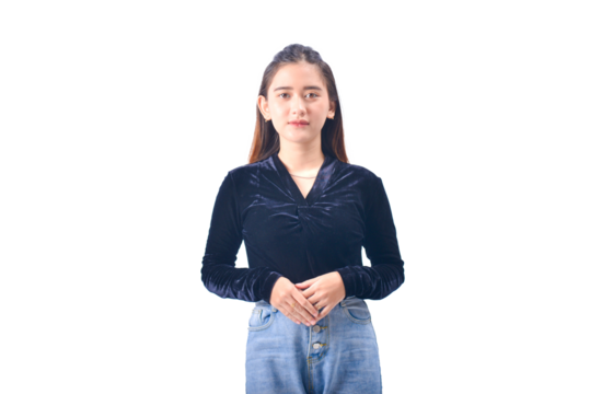 A young Asian Woman in a Black Velvet Top and Denim Jeans making expressive gestures Isolated on white background