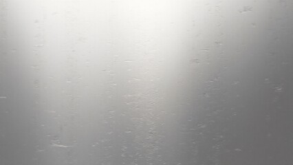 Fine scratches on polished steel, creating a delicate, subtle texture while maintaining its reflective, sleek appearance.