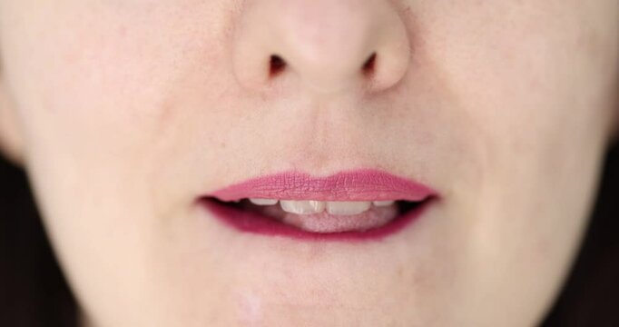 Makeup lips with soft matte lipstick and tongue