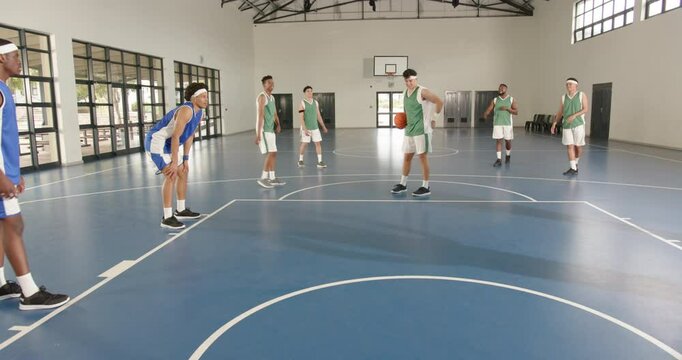 Basketball players preparing for free throw in indoor court game