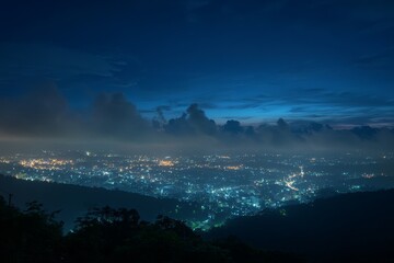Night cityscape, city lights, mountain view, dark clouds, fog, twilight, cityscape at night.