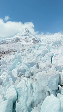Aerial of Glacier and Snow-Capped Mountain on Lagoon 513 Trek near Huaraz, Vertical Fly-Over