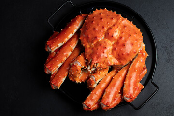 Gourmet Kamchatka Crab on Black Table. Healthy food concept. A hand-taken photo, not an AI